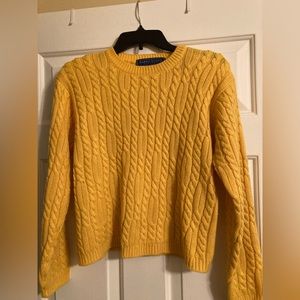 Yellow knitted sweater